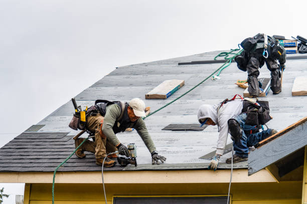 Professional Gutter Installation technician working in Weaverville, CA